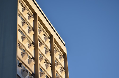 Front view of the Air Conditioning Services office building on a sunny day