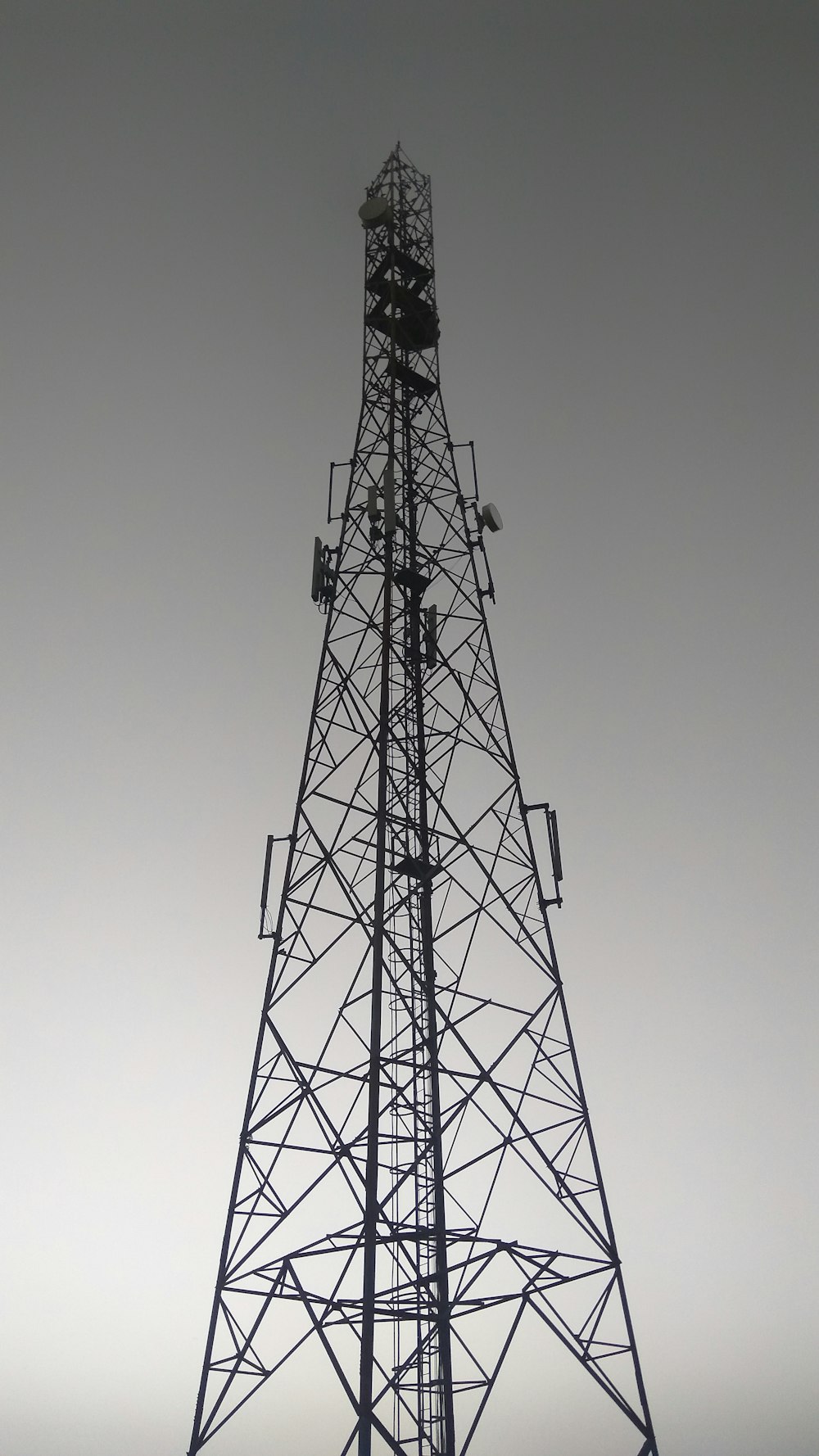 low-angle photography of transmission tower