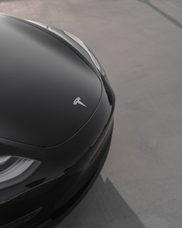 A close-up of the sleek design of a low-speed vehicle.