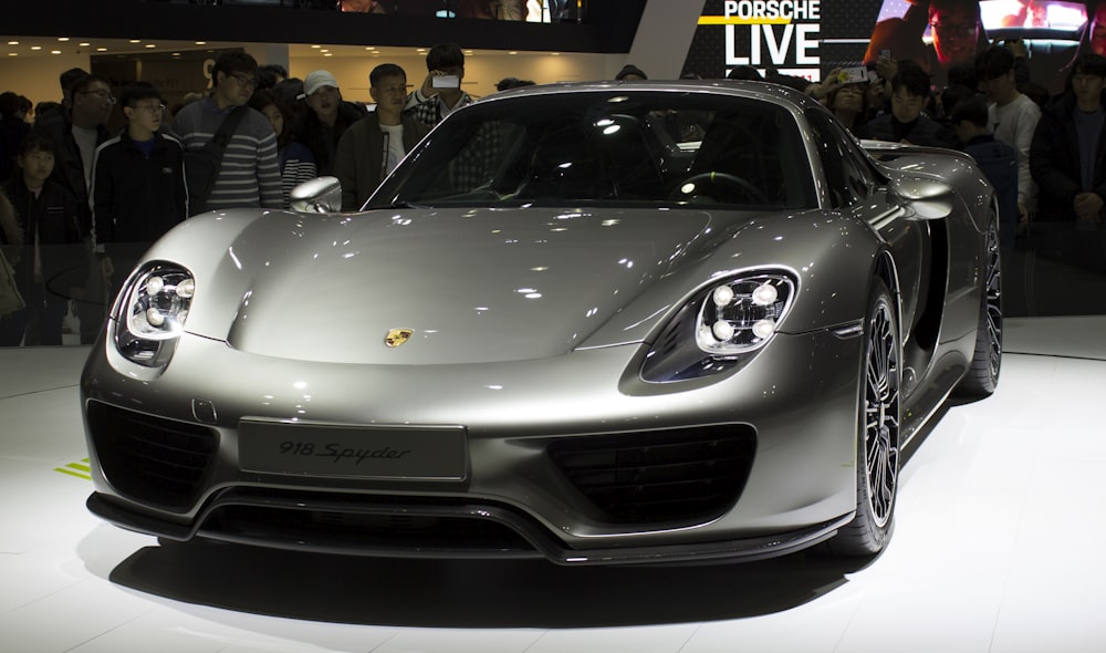 grey Porsche 918 Spyder sports car on display