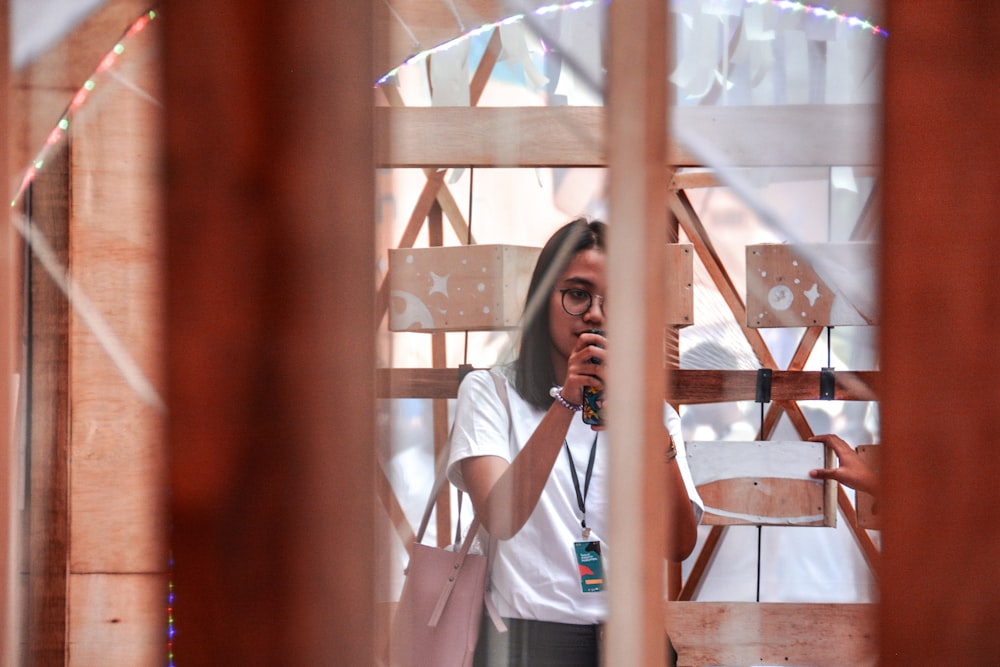 woman wearing white crew-neck t-shirt