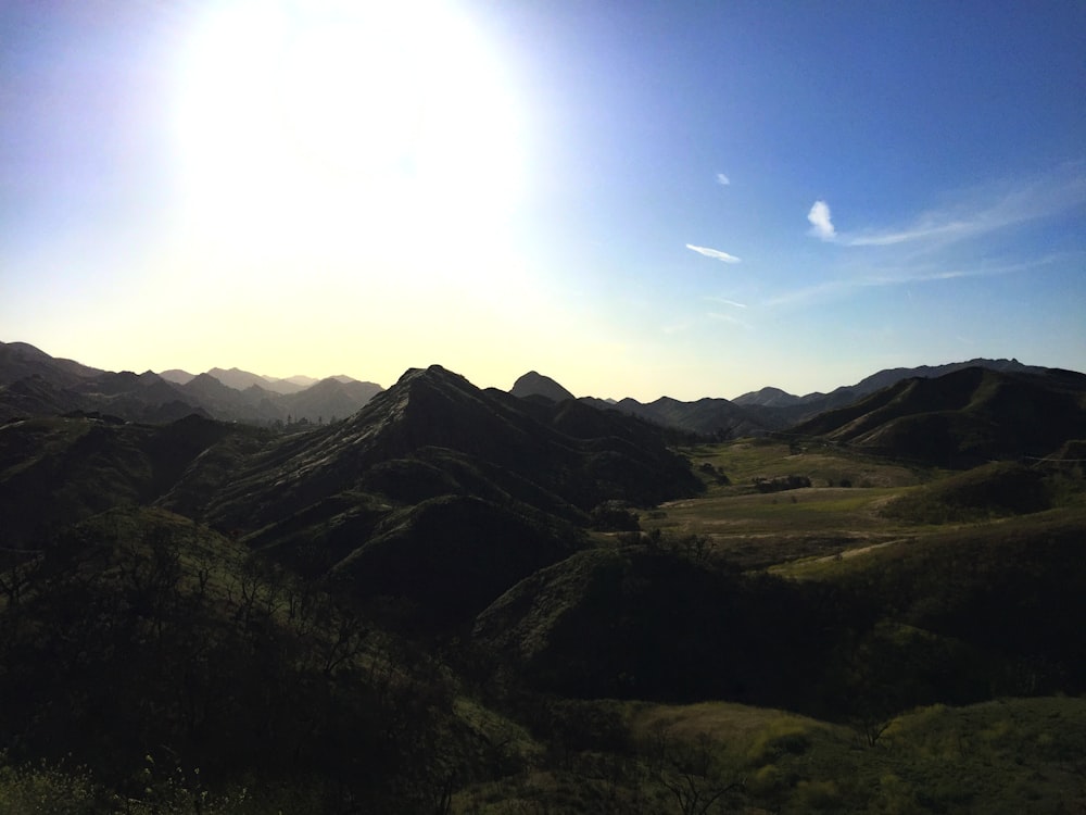 green mountain under blue sky during daytime