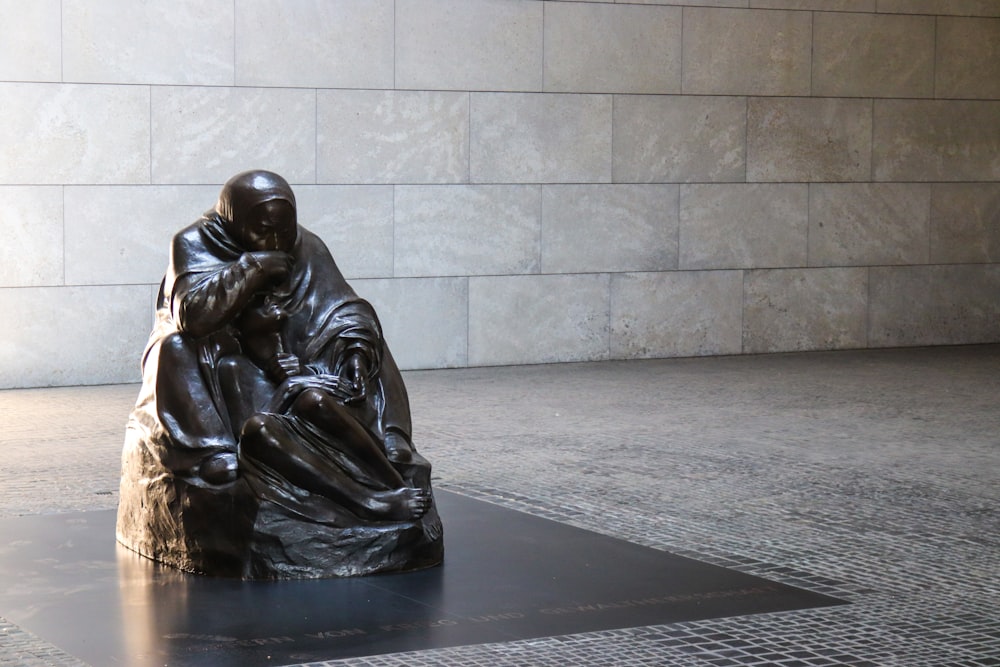 sitting man statue