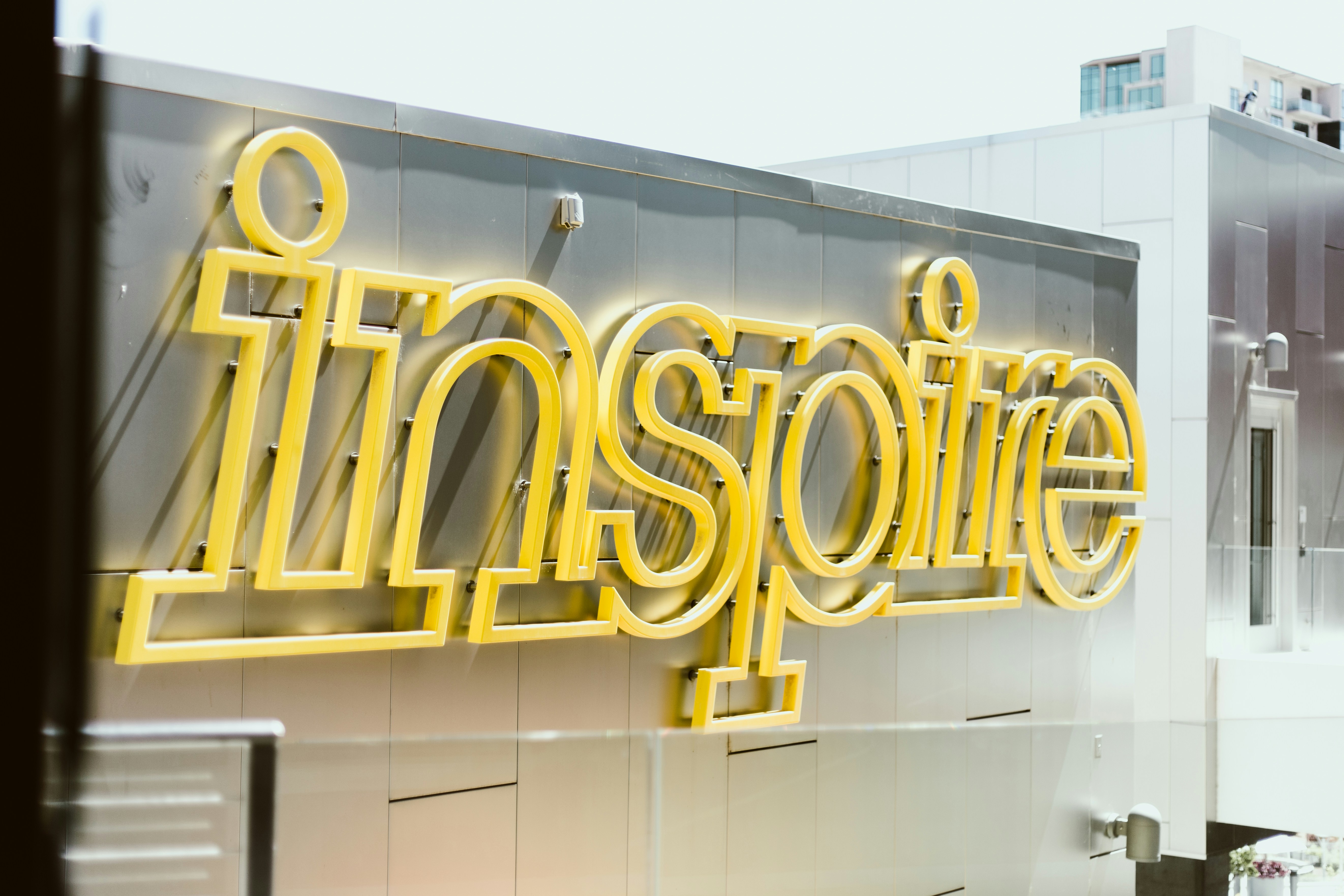 Inspire LED signage on building during day