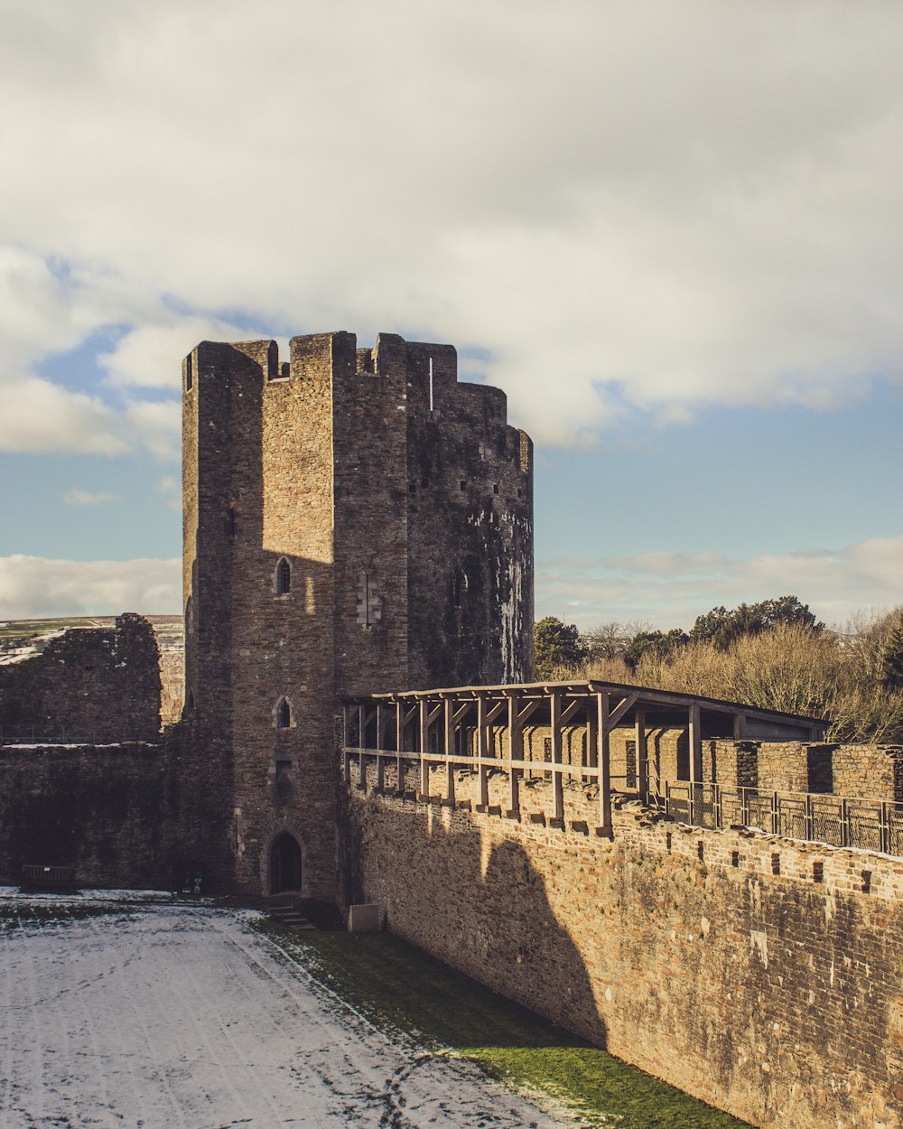 gray concrete castle under cloudy sky during daytime