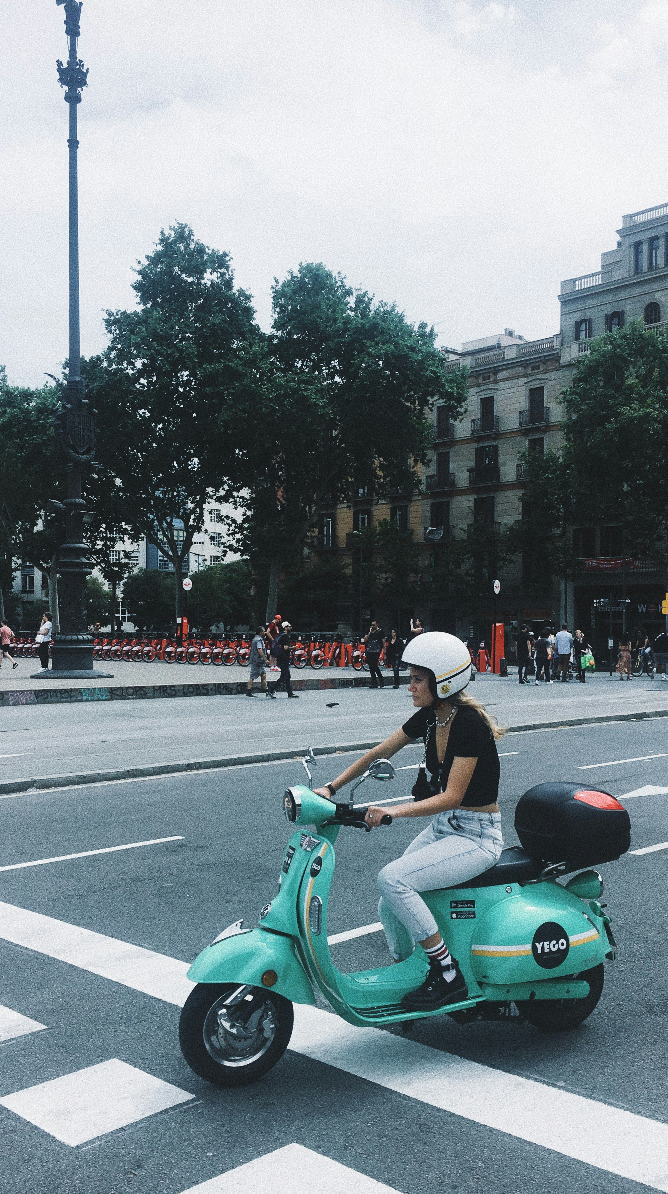 girl riding vespa