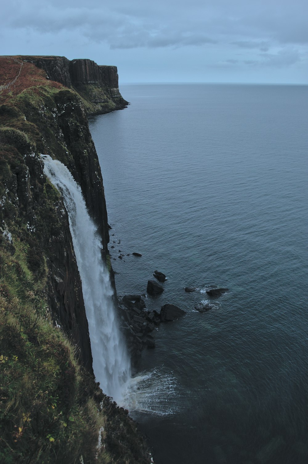 waterfalls beside sea