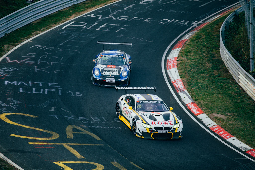Two cars racing side by side