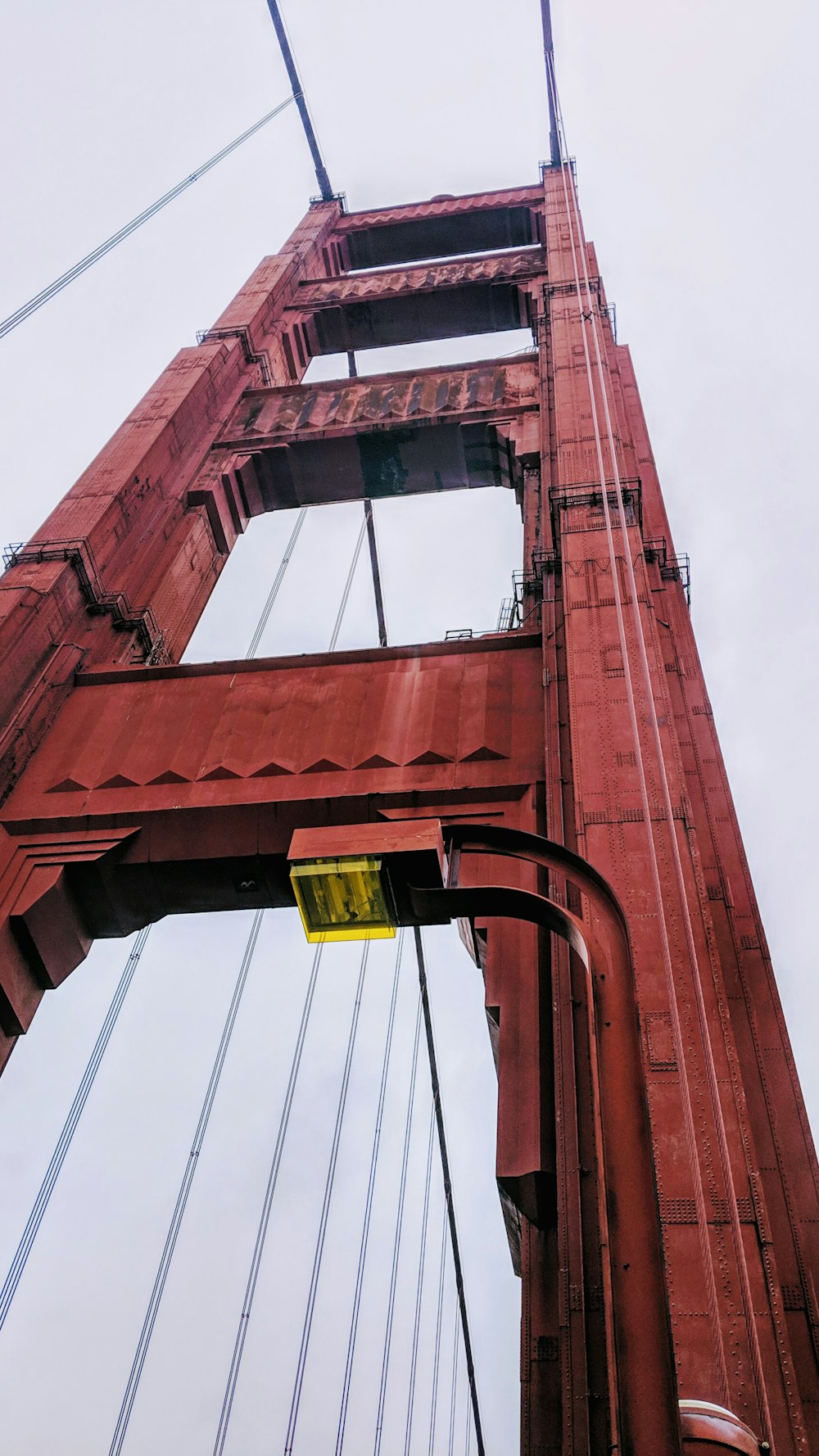 low angle photo of red concrete bridge