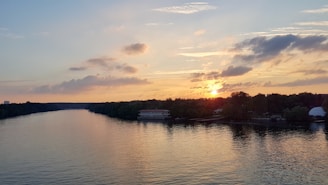 The serene Godavari river reflecting the sunset with temple bells ringing in the background.