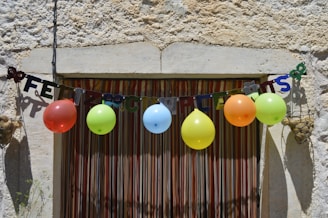 Festive quinceañera banquet with colorful decorations and joyful guests.