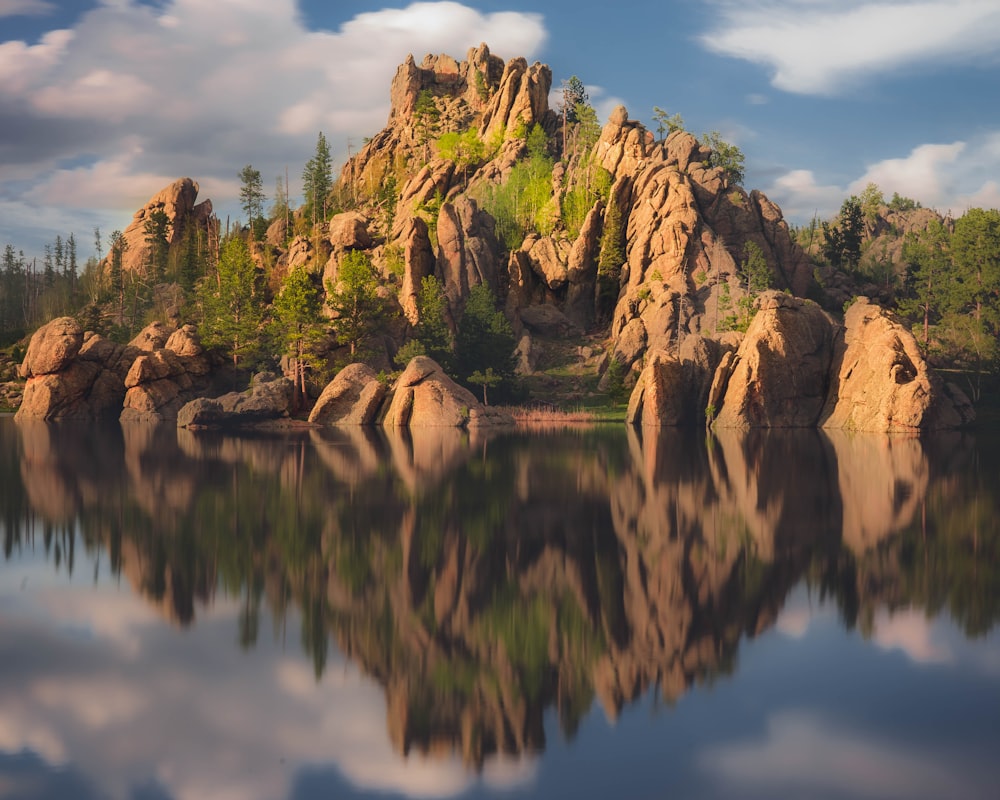 green mountains across body of water