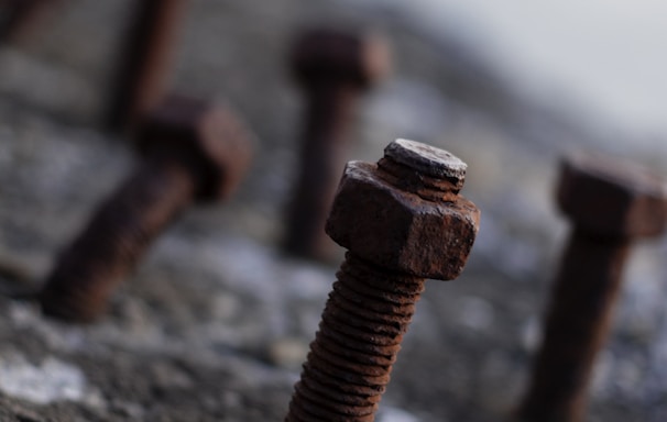 brown rusted bolts