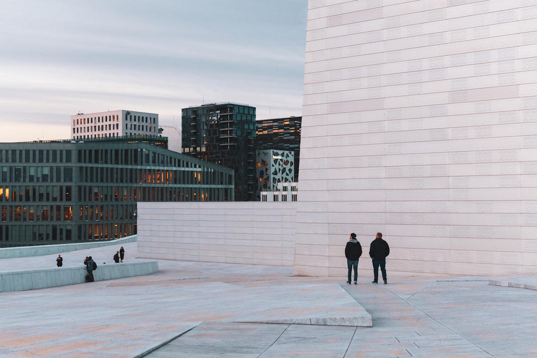 two person standing in front of wall