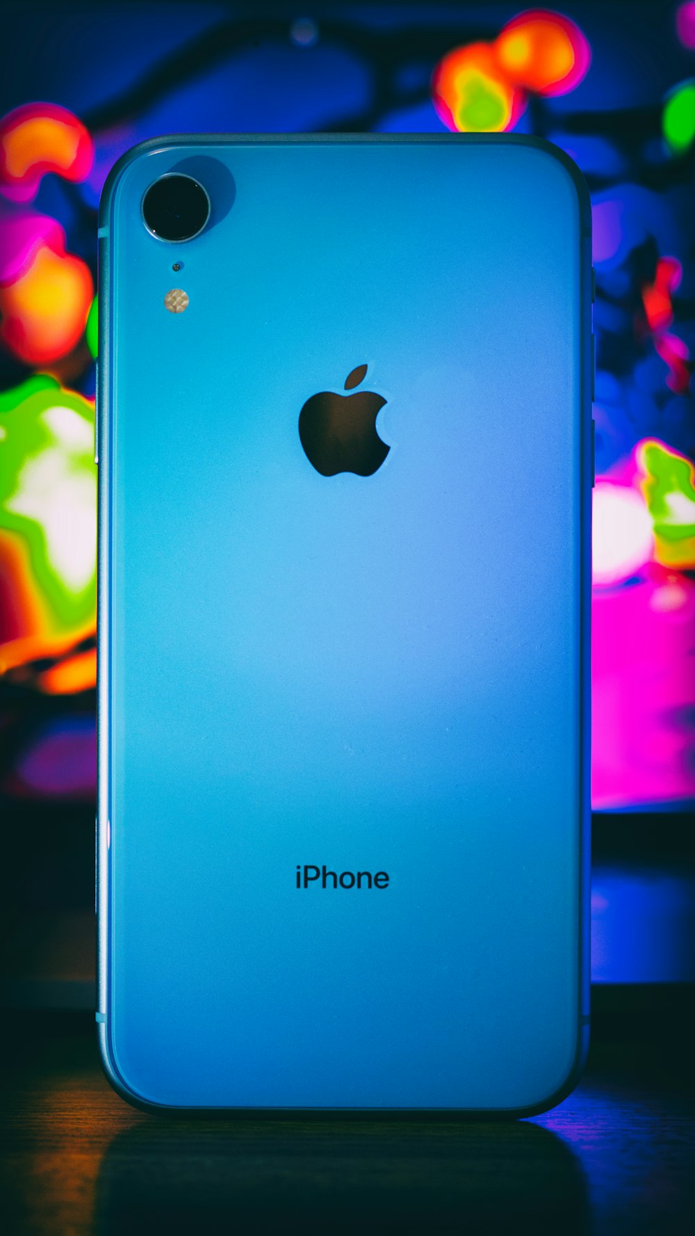 blue Apple iPhone smartphone