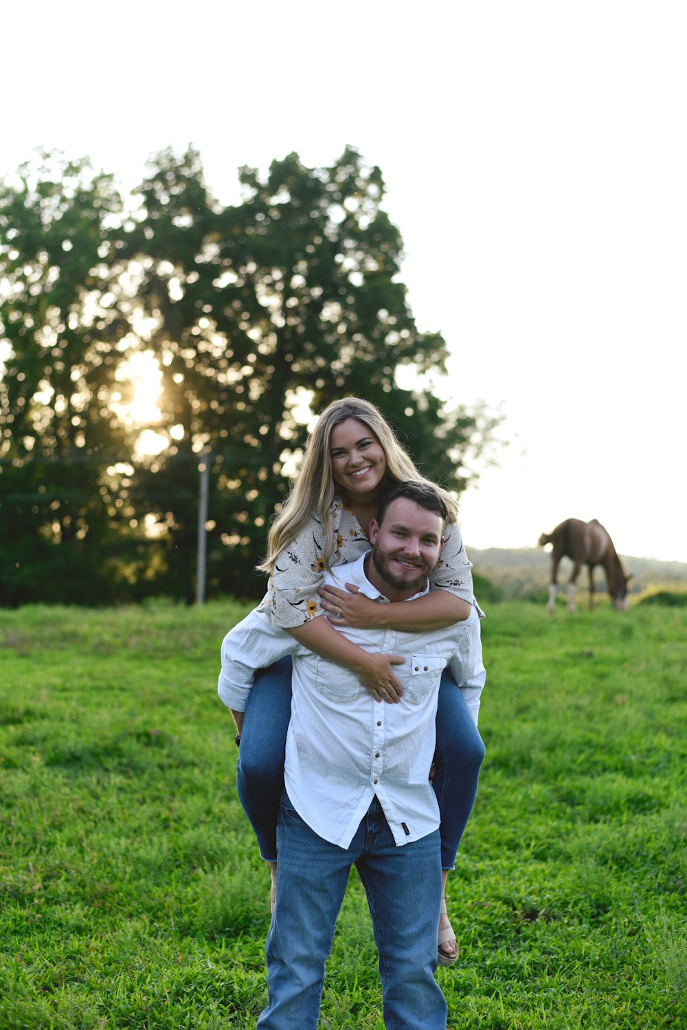 woman carrying woman at back during daytime