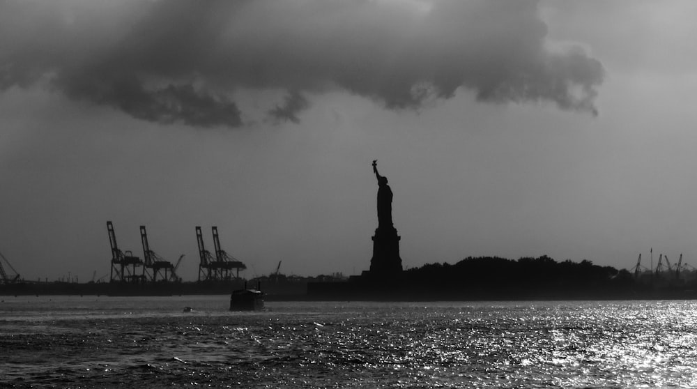 grayscale photo of The Statue of Liberty