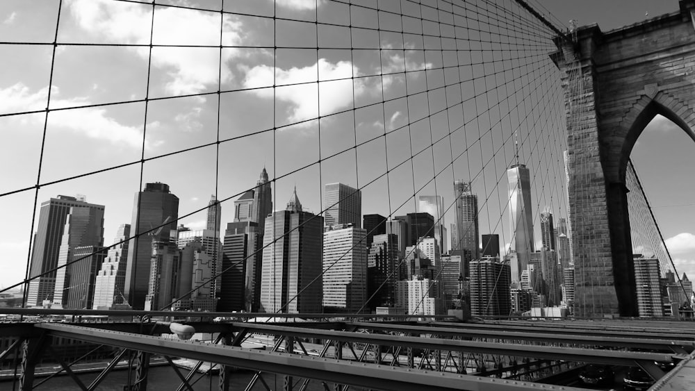 grayscale photo of a bridge in New York