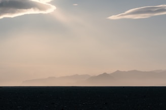 A serene landscape blending nature with ethereal light patterns.