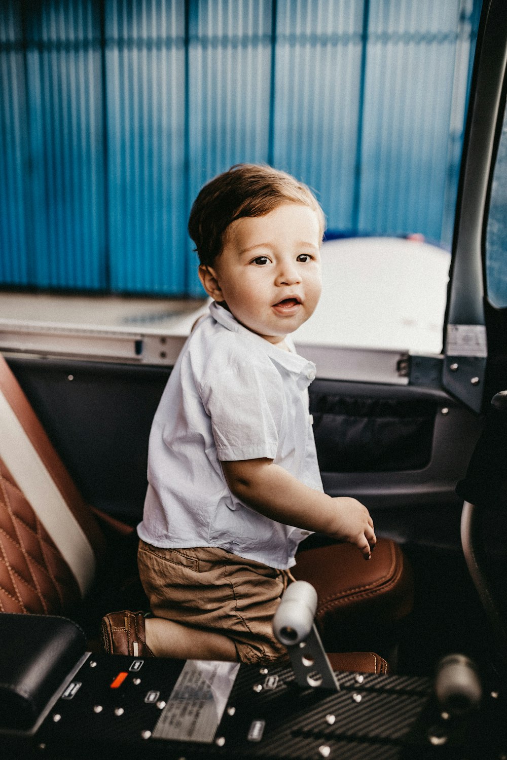 boy wearing white dress shirt