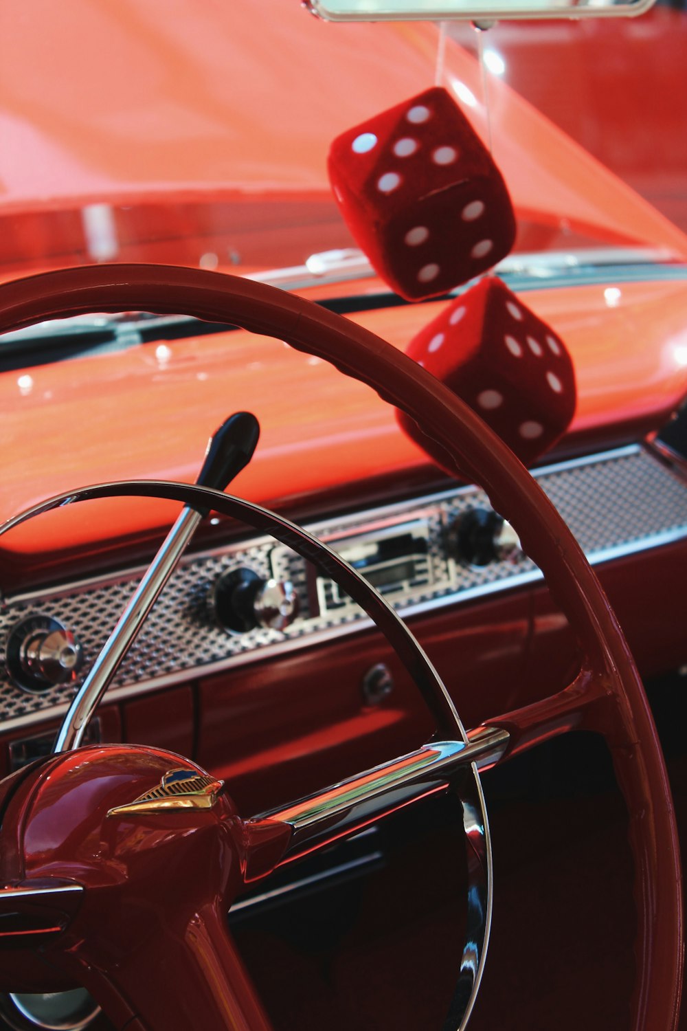 red vehicle steering wheel