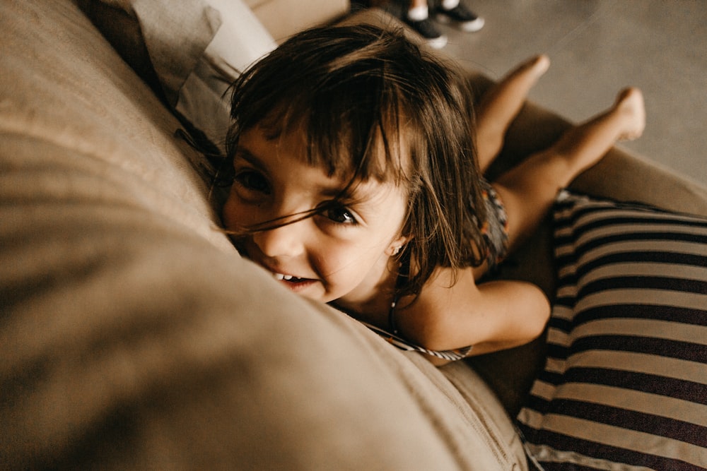 girl lying on sofa