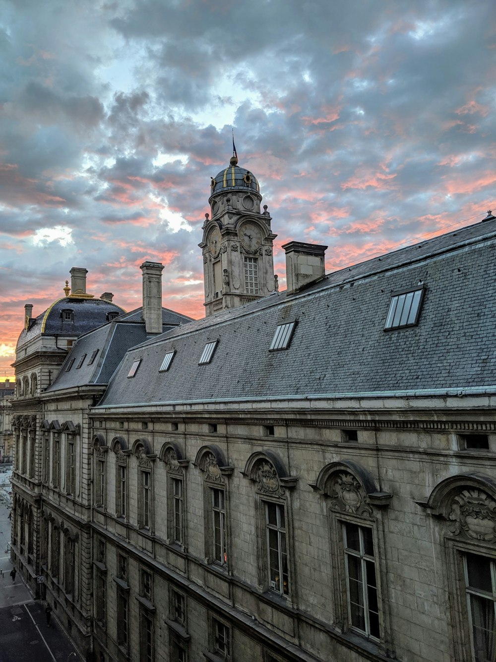 grey and white building with clock tower