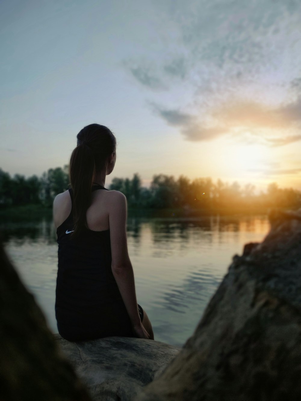 woman wearing black tank top