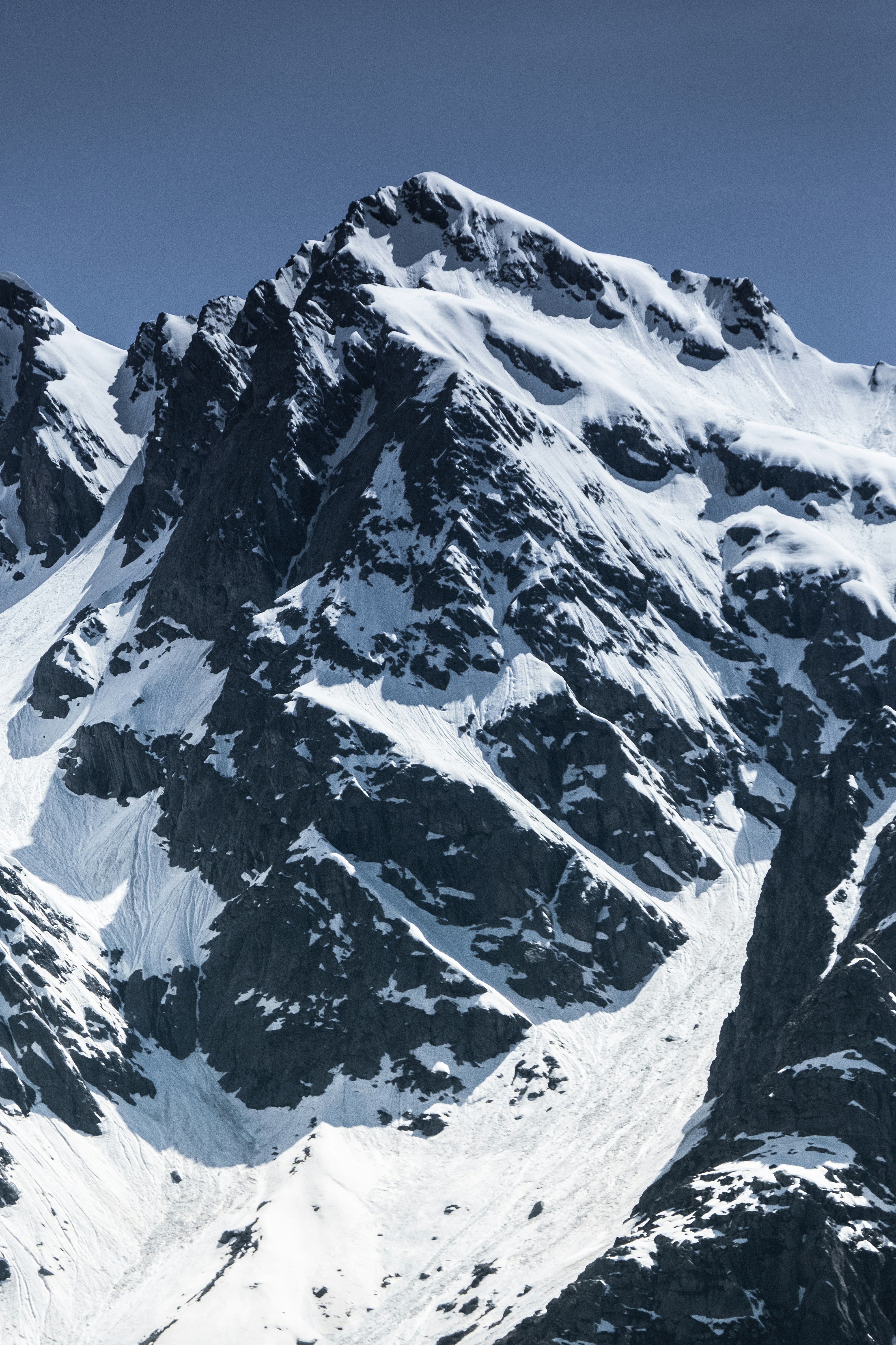 Snow Covered Rocky Mountain Photo Free Mountain Image On Unsplash