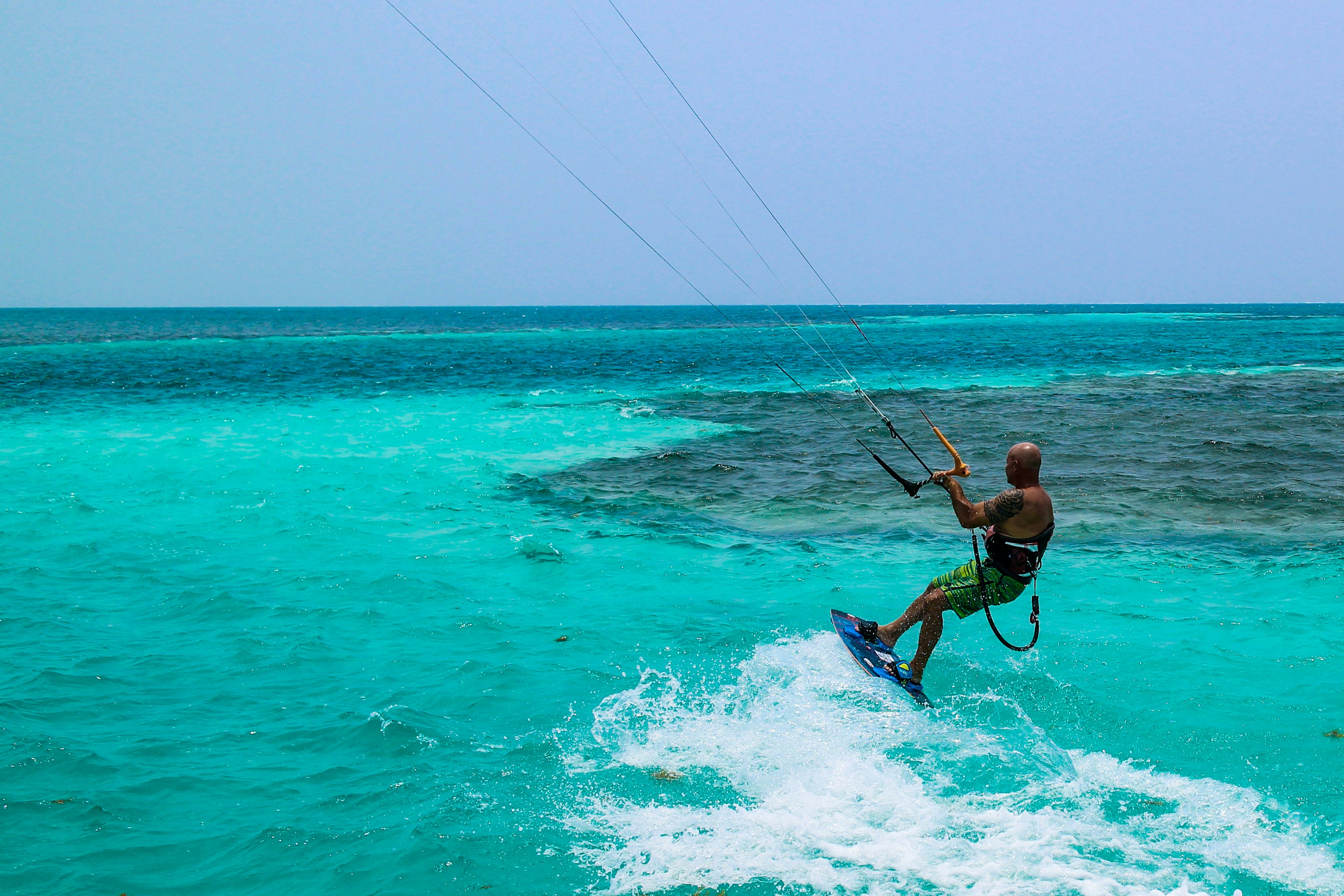 man surfing on ocean