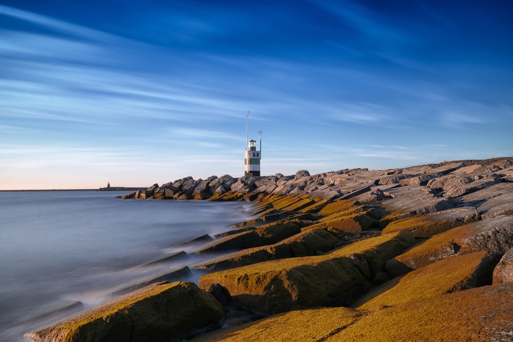 white and gray lighthouse scenery