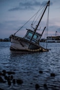 white sailing boat