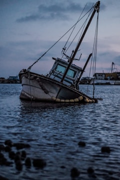 white sailing boat
