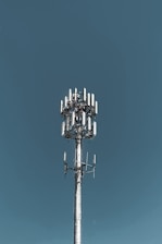 gray steel tower across sky