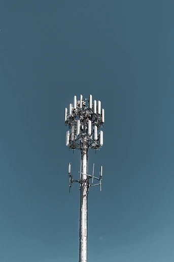 gray steel tower across sky