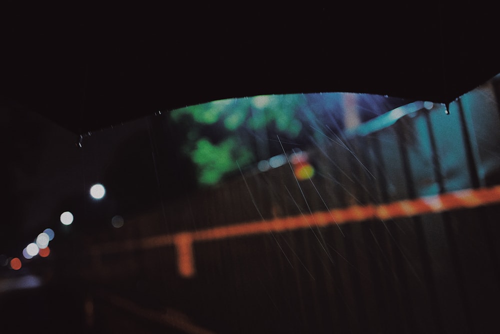 view of black umbrella under the rain