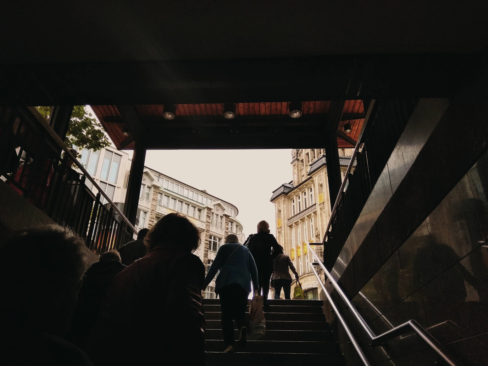People walking up a staircase