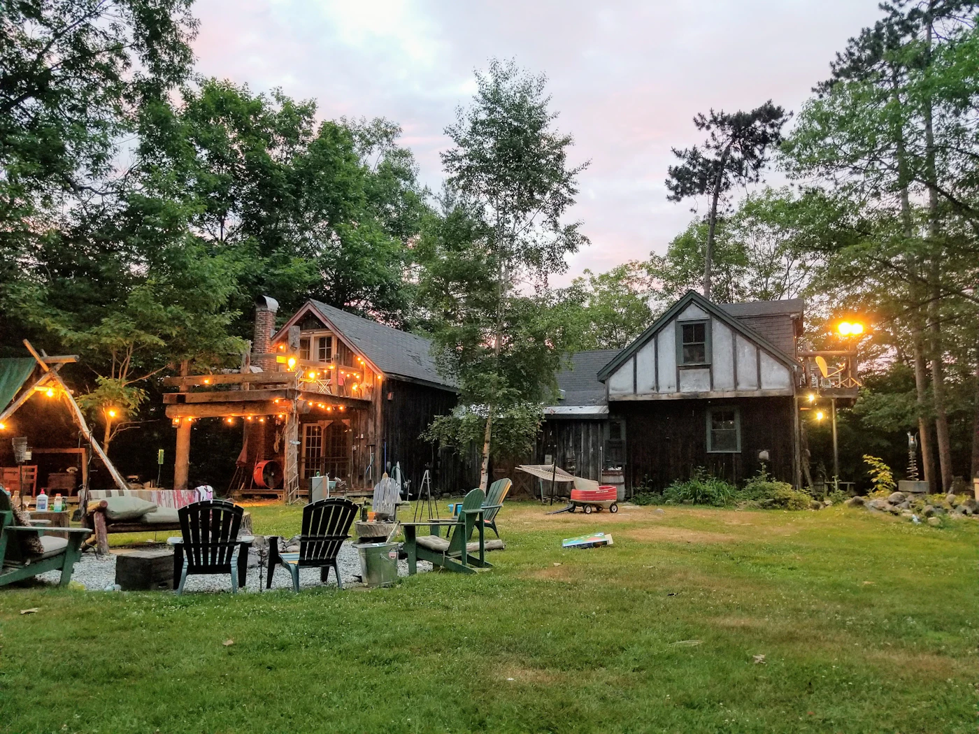 Houses lit up at dusk