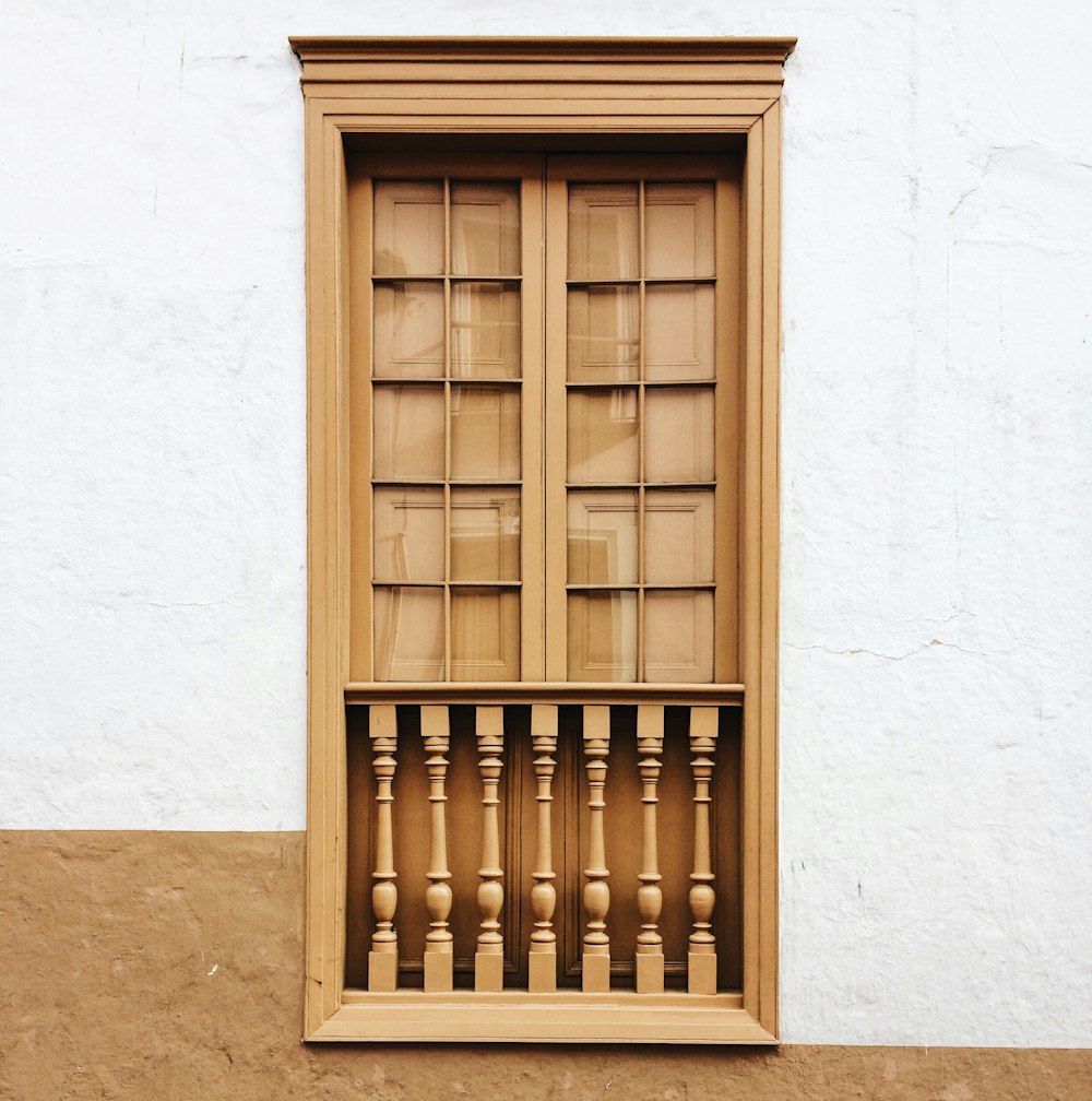 brown wooden door during daytime