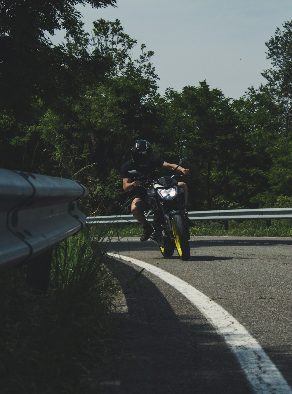 man riding on motorcycle