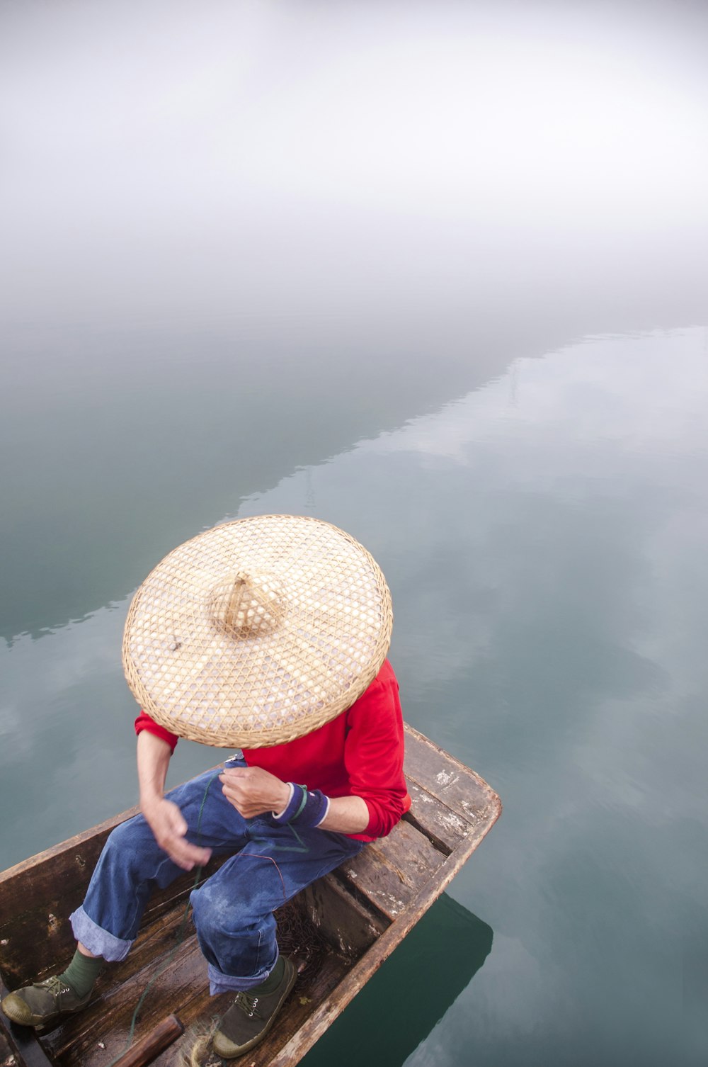 man riding boat