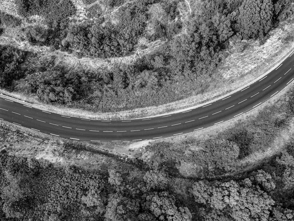 grayscale photography of empty road in high-angle view