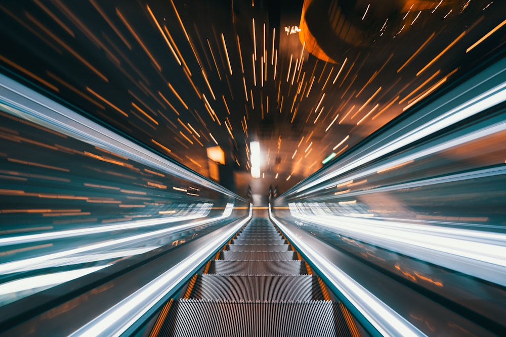 lighted grey escalator