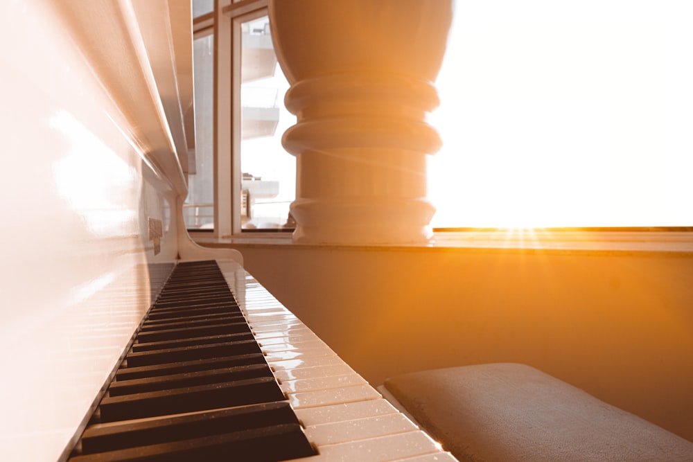 architectural photo of white and black grand piano keys