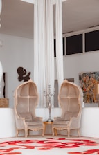 two empty gray sofa chairs