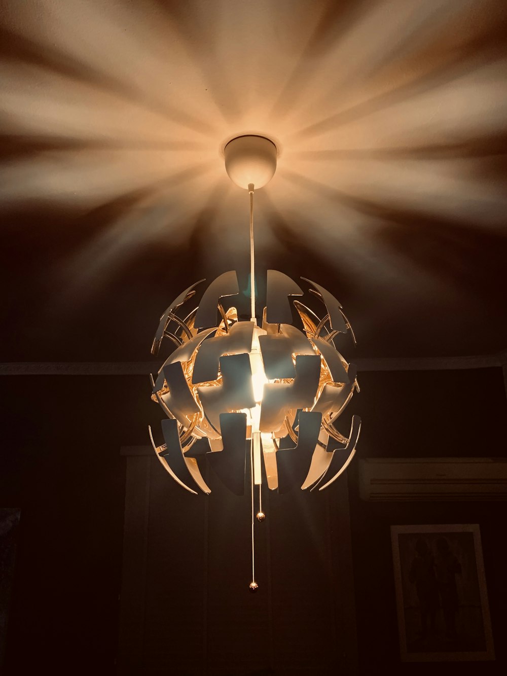 white pendant lamp turned-on