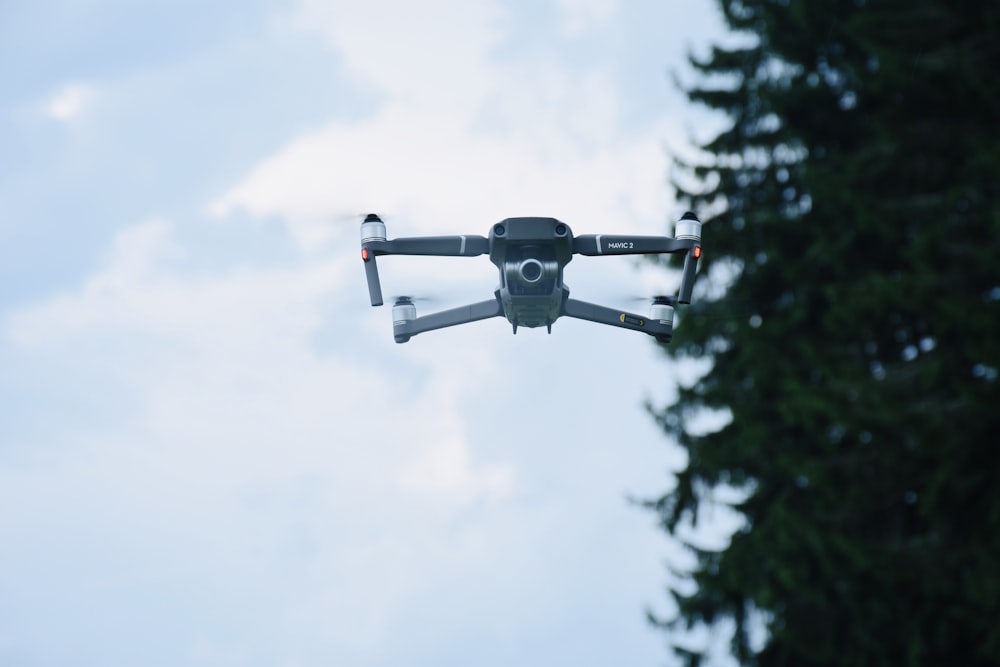 selective focus photography of flying drone