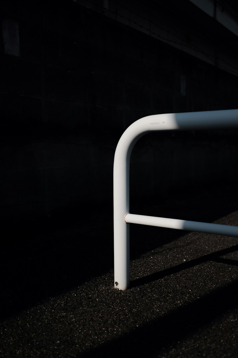 closeup photo of white metal handlebar