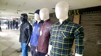 A collection of trendy casual outfits displayed on mannequins.