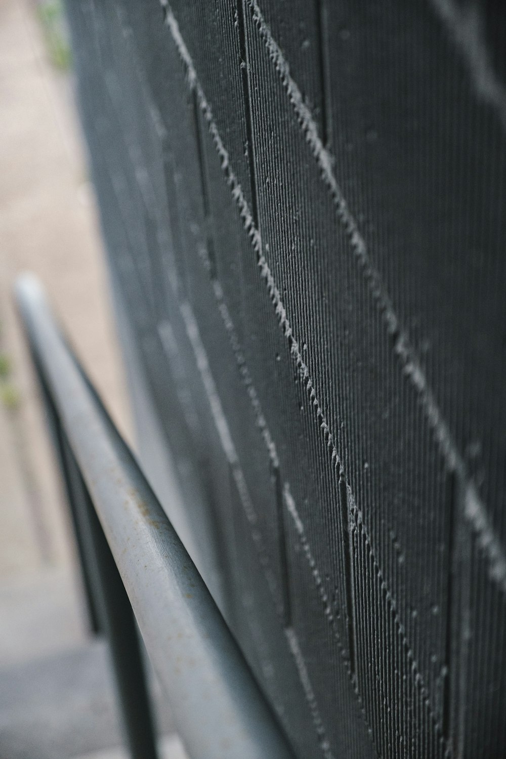 black metal stairs bar near a black wall close-up photography